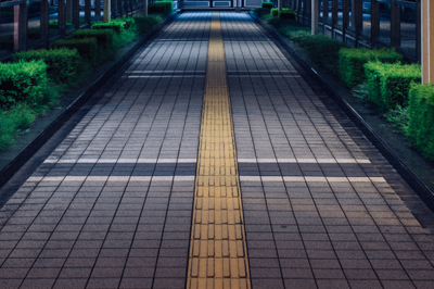 Street pathway in Japan with focus on yellow tactile paving