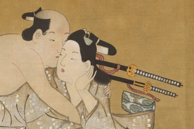 A excerpted image from a painting showing an older samurai, nude, embracing a younger wakashu in a robe.