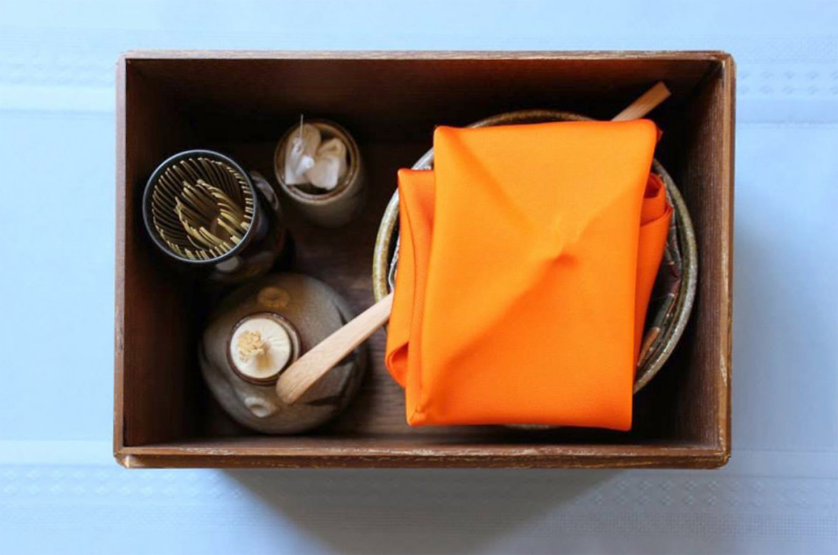 Partial view of a box containing equipment used in tea ceremony